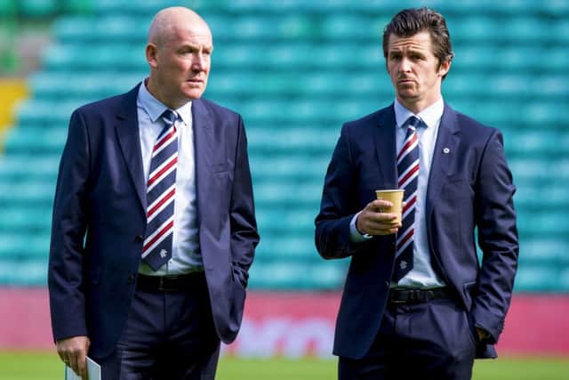 Former Rangers manager Mark Warburton (left) with Joey Barton. Picture: SNS