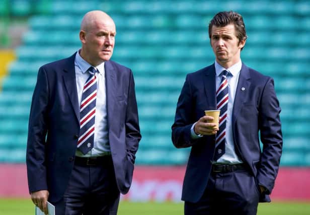 Former Rangers manager Mark Warburton (left) with Joey Barton. Picture: SNS