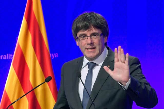Catalan president Carles Puigdemont gives a press conference in Barcelona. Picture: AFP/Getty Images