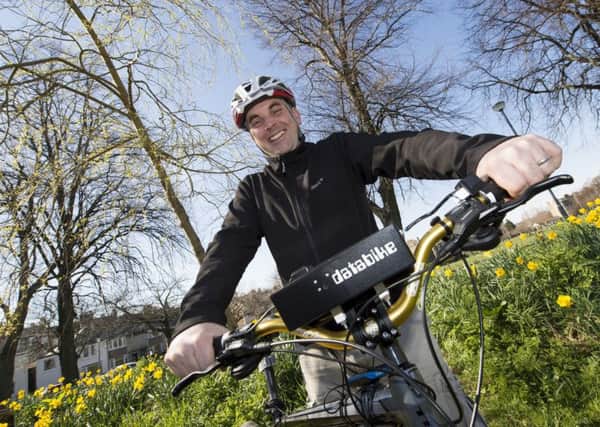 Dr Mark Taylor on his databike. Photograph: Edinburgh Napier University