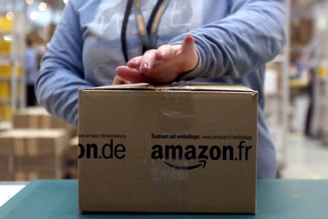 The online retail giant Amazon is facing a bill of at least 250 million euros (£221.5 million) in back taxes after the European Commission. Picture: PA