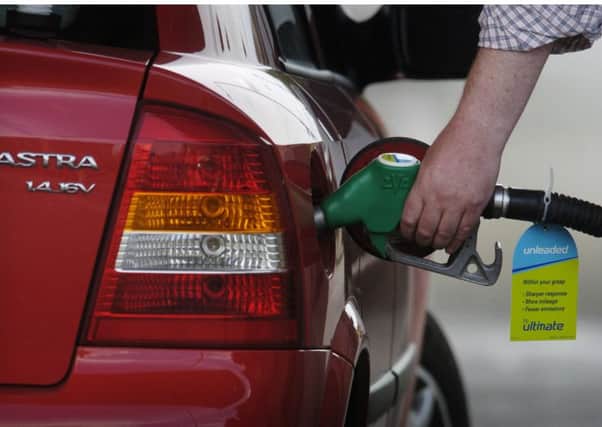 Two supermarket giants are offering major cuts to the price of unleaded petrol. Picture: Donald Macleod