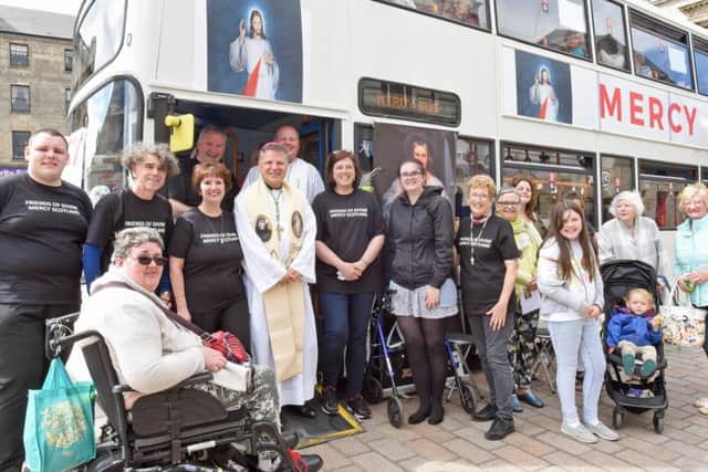Mass with Bishop John Keenan and Father Joseph Burke by the Mercy Bus, at Paisley Cross Cenotaph. Photograph: Paul McSherry