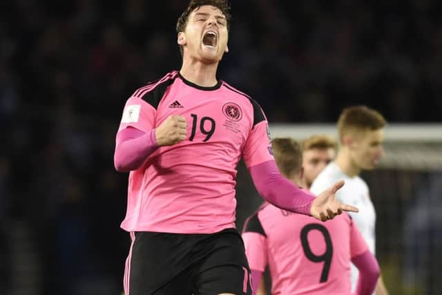 Scotlands Chris Martin, who put Martin Skrtel under pressure and forced him to turn the ball into the Slovakia net, celebrates. Picture: Rob Casey/SNS