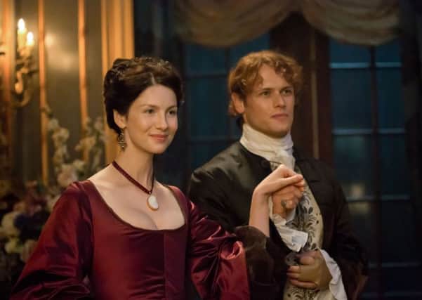 Outlander stars Caitriona Balfe and Sam Heughan. Picture: PA