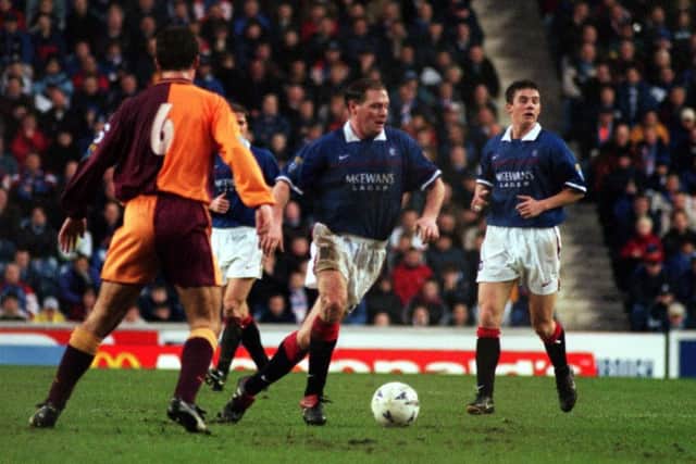 Paul Gascoigne in action for Rangers against Motherwell at Ibrox. Picture: TSPL
