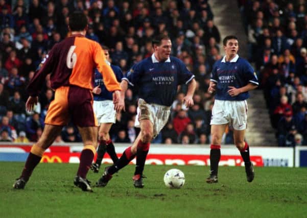 Paul Gascoigne in action for Rangers against Motherwell at Ibrox. Picture: TSPL