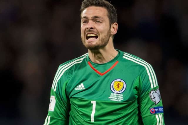 Craig Gordon celebrates after Martin Skrtel's own goal put Scotland in front against Slovakia. Picture: Bill Murray/SNS