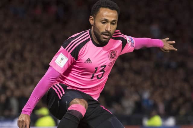 Ikechi Anya in action for Scotland in the World Cup win over Slovakia. Picture: Rob Casey/SNS