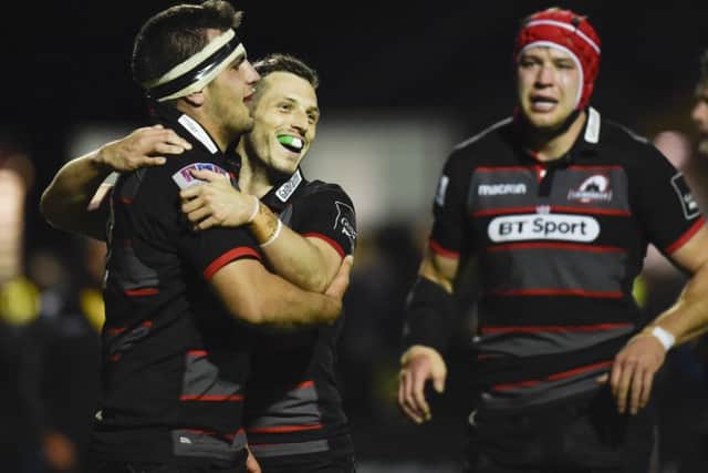 Jason Tovey congratulates Stuart McInally on his first-half try. It turned out to be the hosts' only try of the match. Picture: SNS