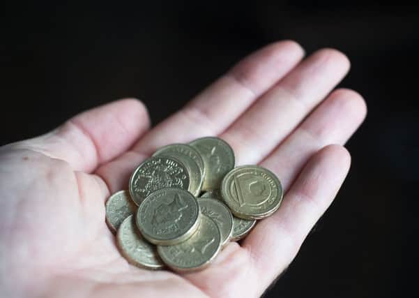 The circular pounds are leaving circulation. Photograph: John Devlin