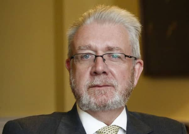 Scottish Brexit minister Mike Russell
says the impact of the EU vote is already being felt