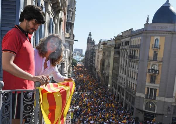 A pro-Spanish unity rally marches through Barcelona in response to last Sundays disputed referendum on Catalan independence. Picture: Jeff J Mitchell/Getty