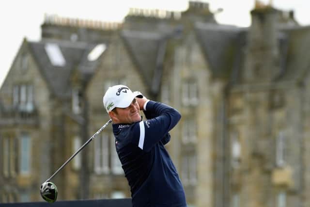 Marc Warren tees off on the second hole during the final round of the Dunhill Links Championship at the Old Course. Picture: Ross Kinnaird/Getty Images