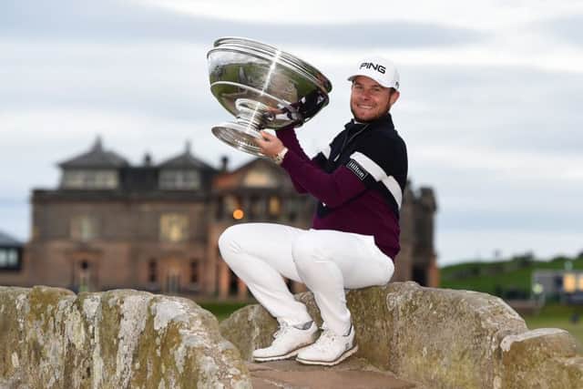 England's Tyrrell Hatton lifts the trophy at the Old Course, St Andrews, after retaining the Alfred Dunhill Links Championship title. Picture: Paul Devlin/SNS
