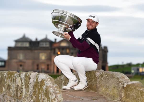 England's Tyrrell Hatton lifts the trophy at the Old Course, St Andrews, after retaining the Alfred Dunhill Links Championship title. Picture: Paul Devlin/SNS