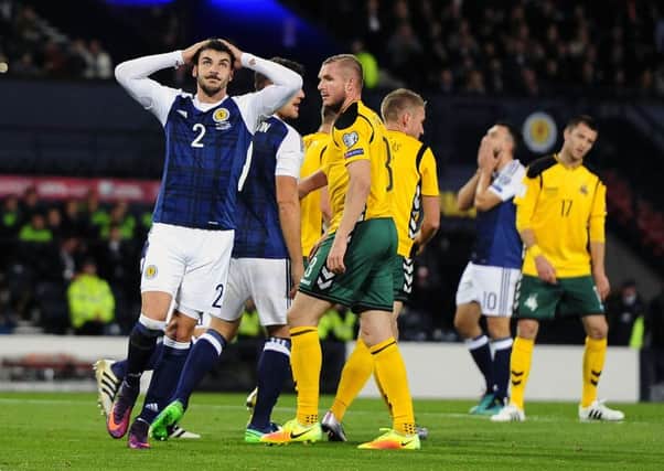 Callum Paterson holds his head during the 1-1 draw with Lithuania at Hampden last October, the most disappointing result of the World Cup qualifying campaign. Picture Michael Gillen