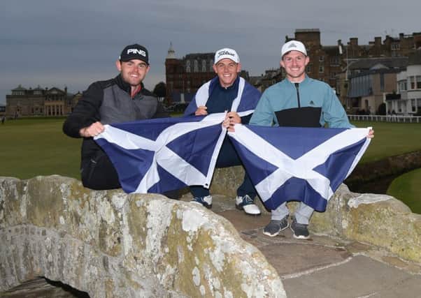 Connor Syme, right, pictured on the Swilken Bridge with Liam Johnston, left, and Grant Forrest has made an impressive start to his pro career. Picture: Ross Kinnaird/Getty Images