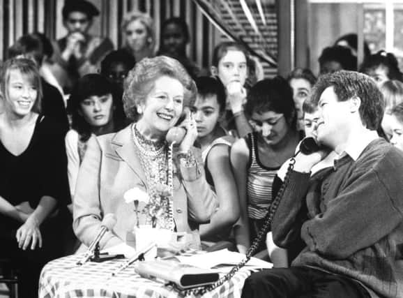 Margaret Thatcher taking part in a phone-in on the BBC's Saturday Superstore with presenter John Craven. Picture: PA Wire