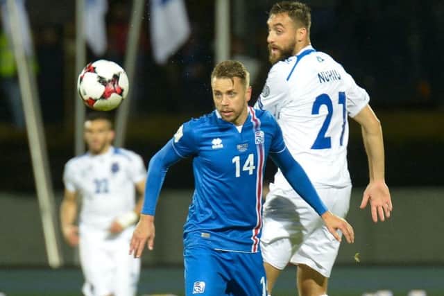 Aberdeen and Iceland defender Kari Arnason in action against Kosovo. Picture: Haraldur Gudjonsson/AFP/Getty Images