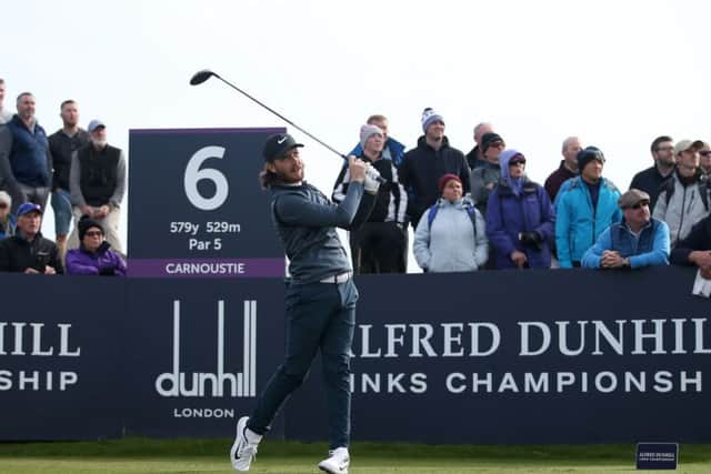 Tommy Fleetwood plays from the sixth tee at Carnoustie on his way to shooting a new course record 63. Picture: Jane Barlow/PA Wire