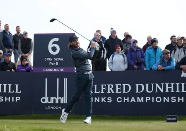 Tommy Fleetwood plays from the sixth tee at Carnoustie on his way to shooting a new course record 63. Picture: Jane Barlow/PA Wire