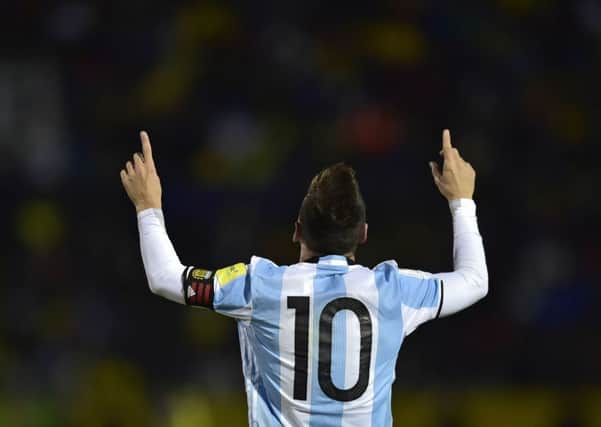Lionel Messi wheels away in delight as his goals send Argentina to the 2018 World Cup finals