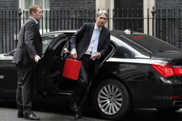 Britain's Chancellor of the Exchequer Philip Hammond arrives at Downing Street. Picture: ADRIAN DENNIS/AFP/Getty Images