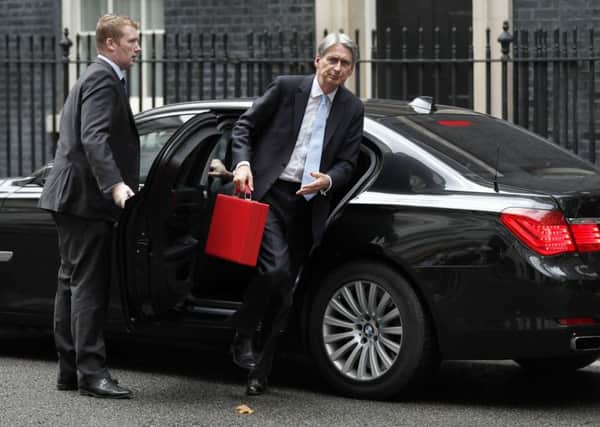 Britain's Chancellor of the Exchequer Philip Hammond arrives at Downing Street. Picture: ADRIAN DENNIS/AFP/Getty Images