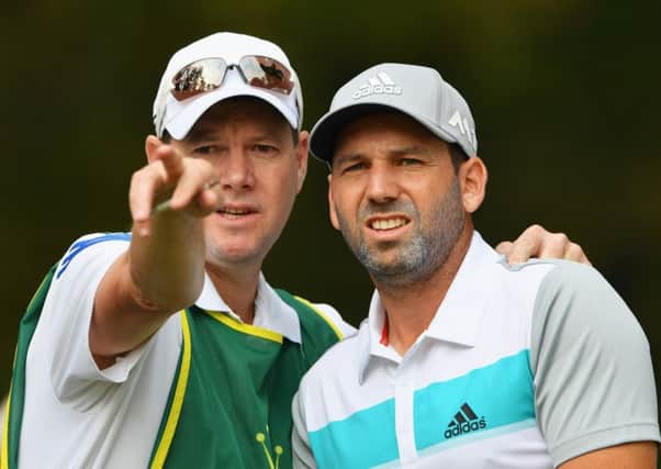 Masters champion Sergio Garcia of Spain and his caddie Glen Murray in discussion during the Pro-Am tournament ahead of the Italian Open. Picture: Stuart Franklin/Getty