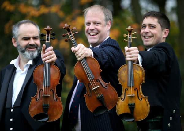 The three violins, made in commemoration of the war poets who met at the golf club in 1917, are to be played together for the first time. Picture: Jane Barlow/PA Wire
