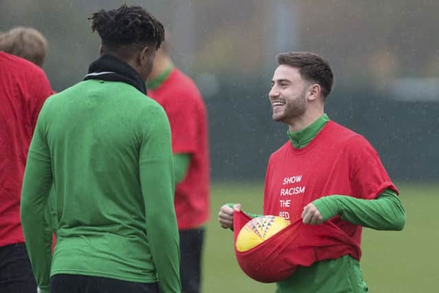 Patrick Roberts, right, says the Celtic squad is in buoyant mood ahead of their home clash with Dundee. Picture: SNS