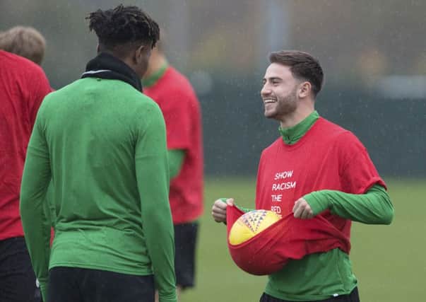 Patrick Roberts, right, says the Celtic squad is in buoyant mood ahead of their home clash with Dundee. Picture: SNS