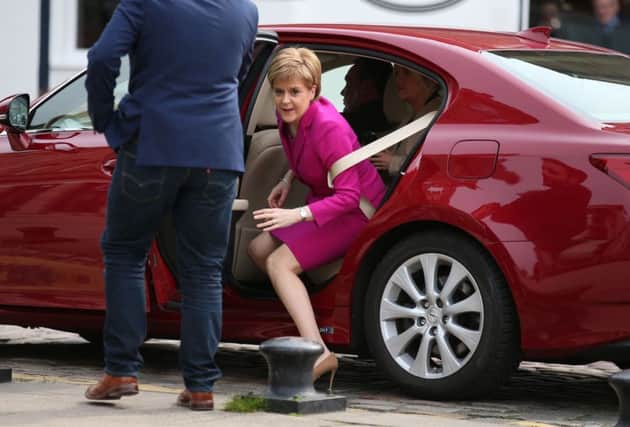 First Minister Nicola Sturgeon is being called upon to start an investigation into ministerial use of taxpayer-funded cars. Picture: PA
