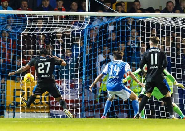 Carlos Pena scores to make it 1-0 Rangers. Picture: SNS