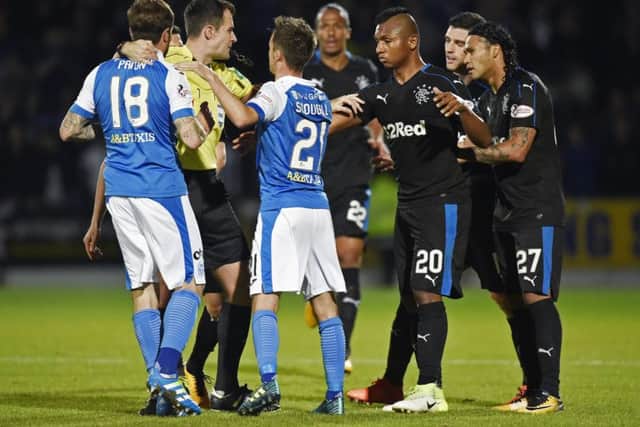 St Johnstone and Rangers players clash after an altercation between Paul Paton (far left) and Graham Dorrans (second right). Picture: SNS
