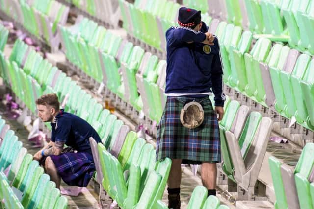 There was more heartbreak for the Tartan Army as Scotlands World Cup dream died in Ljubljana.                  Photograph: Alan Harvey/SNS