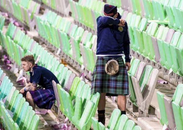 There was more heartbreak for the Tartan Army as Scotlands World Cup dream died in Ljubljana.                  Photograph: Alan Harvey/SNS