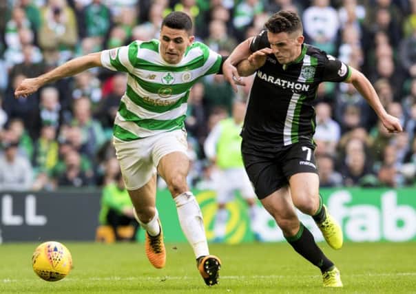 Celtic's Tom Rogic views with John McGinn during last month's match. Picture: Alan Harvey/SNS