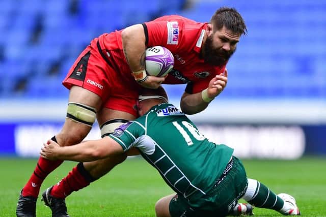 Edinburgh's Cornell du Preez is tackled by Todd Gleave of London Irish. Picture: Getty