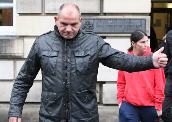 Gary McCourt walks free from the appeal court after it rejected a crown appeal to increase his sentence for the killing of cyclost Audrey Fyfe. Picture: Lesley Donald