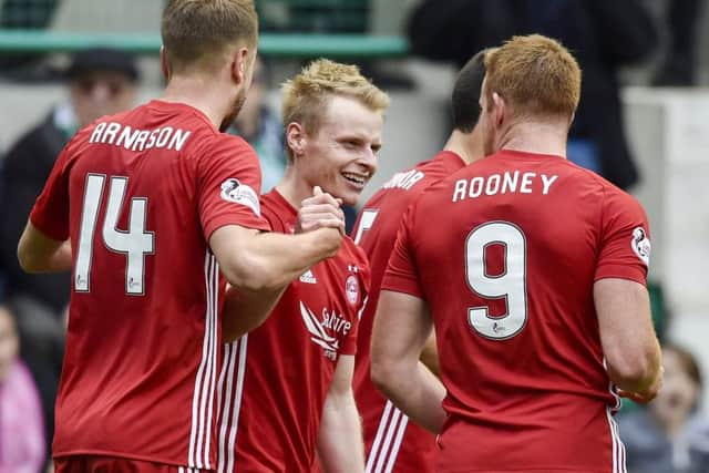 Gary Mackay-Steven is all smiles as he celebrates his winner on Saturday. Picture: SNS.