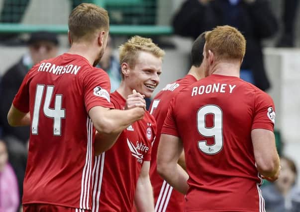 Gary Mackay-Steven is all smiles as he celebrates his winner on Saturday. Picture: SNS.
