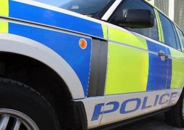 A teenager was attacked by two armed males in Glasgow