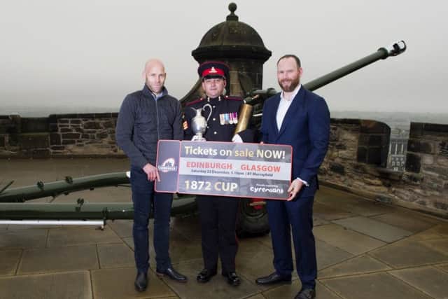 Simon Webster and Graeme Morrison help promote ticket sales for  this seasons 1872 Cup opener at BT Murrayfield on 23 December. Picture: SNS.