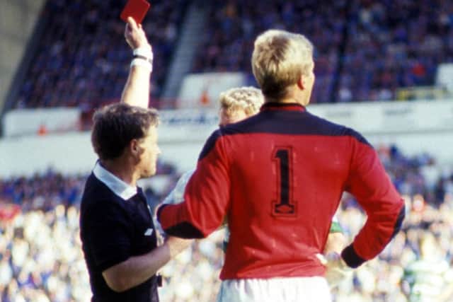 Chris Woods and Frank McAvennie (obscured) receive their marching orders from referee Jim Duncan. Picture: SNS Group
