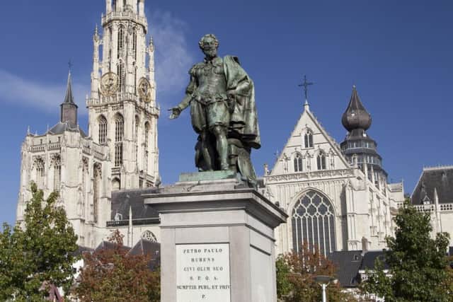 The bronze statue of Rubens, with the Cathedral Of Our Lady in the background. Photograph: Getty Images/iStock