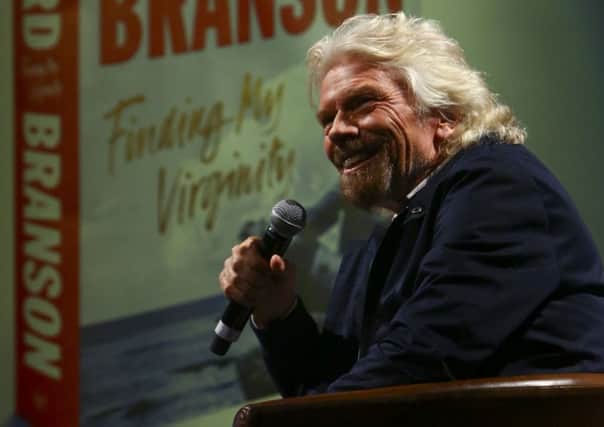 Sir Richard Branson opened up about being the target of cons. Picture: Geoff Caddick/PA Wire