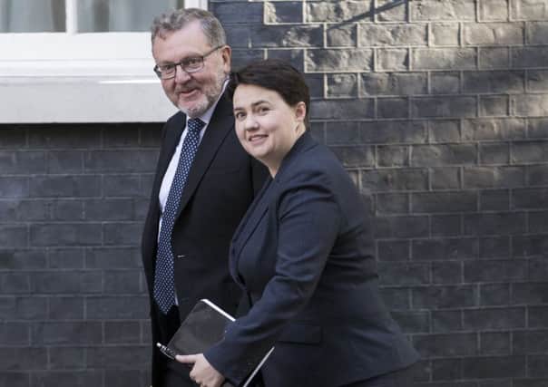 Scotland Secretary David Mundell and  Scottish Conservative Leader Ruth Davidson arrive at Downing Street for the weekly cabinet meeting. Picture; Getty