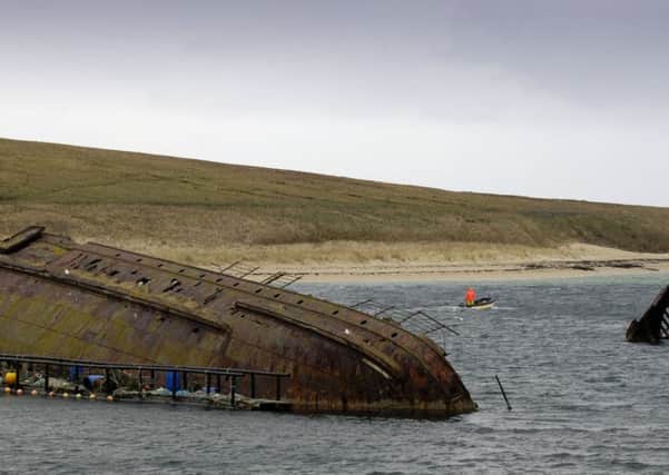 The diver had been exploring wreckage at Scapa Flow.